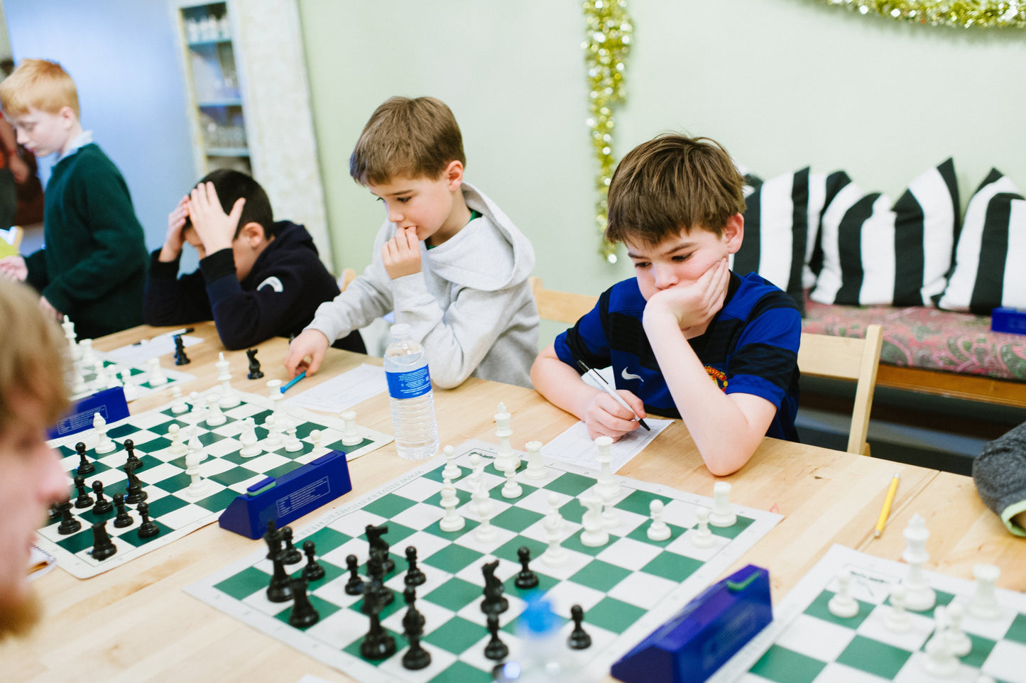 Little boys playing chess